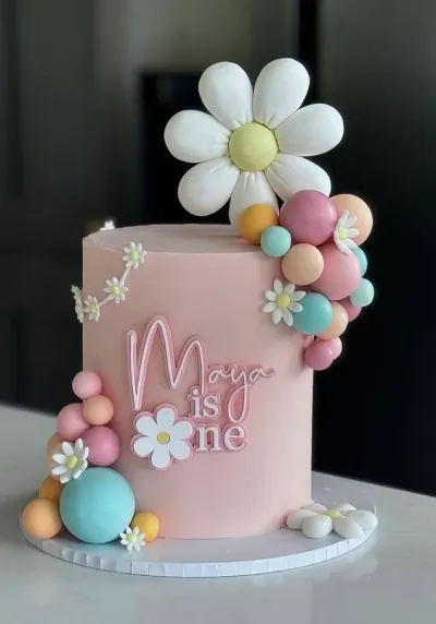 daisy birthday 1 Tier - white theme with large white daisy and colorful fondant spheres daisy birthday 1 Tier - white theme with large white daisy and colorful fondant spheres