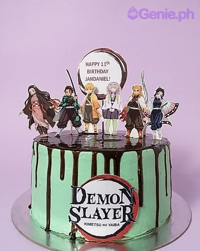 A black 1 Tier cake featuring Demon Slayer characters and logo printouts, and a birthday message. A black 1 Tier cake featuring Demon Slayer characters and logo printouts, and a birthday message.