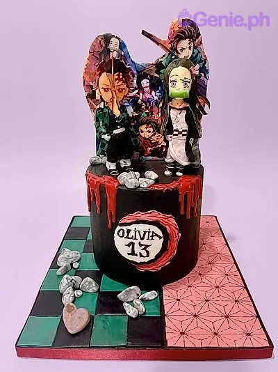 A black 1 Tier cake featuring Demon Slayer character backdrop, Tanjiro and Nezuko figurines, grey fondant stones and a red icing drip. A black 1 Tier cake featuring Demon Slayer character backdrop, Tanjiro and Nezuko figurines, grey fondant stones and a red icing drip.