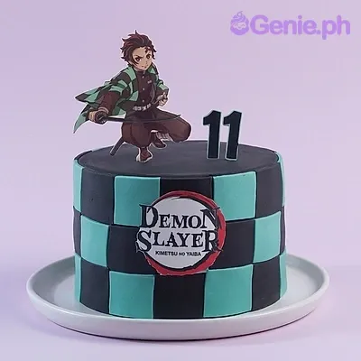 A black 1 Tier cake featuring a Tanjiro Kamado character printout, number 11 printout, a Demon Slayer logo, and teal and black checkered panels. A black 1 Tier cake featuring a Tanjiro Kamado character printout, number 11 printout, a Demon Slayer logo, and teal and black checkered panels.