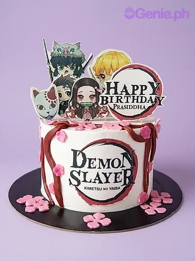 A white 1 tier cake featuring Demon Slayer characters, a 'Happy Birthday' banner, the Demon Slayer logo, red icing vines, and pink fondant flowers. A white 1 tier cake featuring Demon Slayer characters, a 'Happy Birthday' banner, the Demon Slayer logo, red icing vines, and pink fondant flowers.
