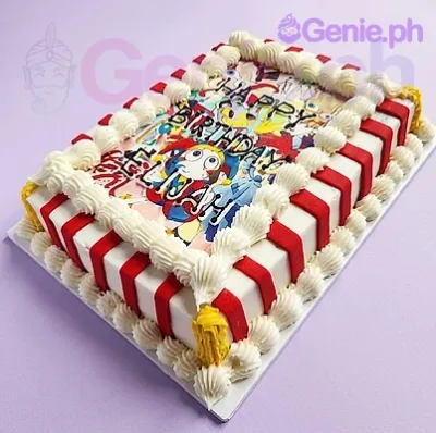 A white, red, yellow rectangle Digital Circus cake with character printout, red stripes, white rosettes, and 'Happy Birthday Elijah' text. A white, red, yellow rectangle Digital Circus cake with character printout, red stripes, white rosettes, and 'Happy Birthday Elijah' text.