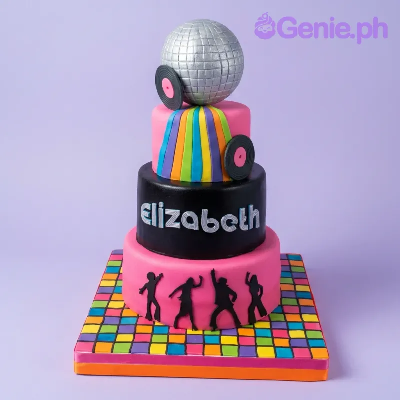 A multicolor 3 Tier Fondant cake themed around Disco, featuring a silver disco ball topper and vinyl records with rainbow stripes. A multicolor 3 Tier Fondant cake themed around Disco, featuring a silver disco ball topper and vinyl records with rainbow stripes.