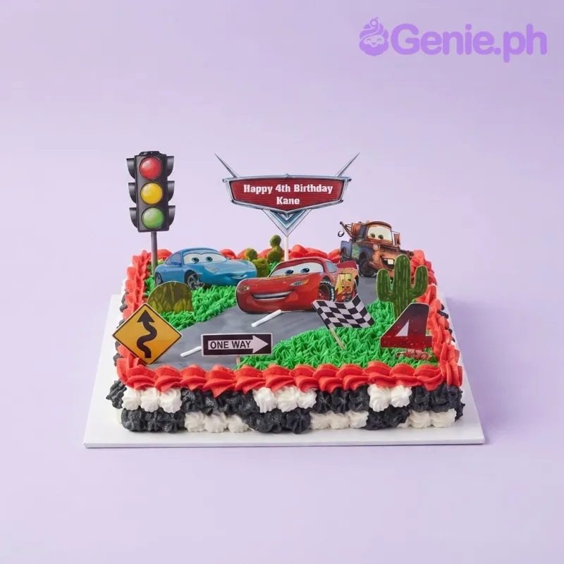 A green and white square Disney Cars cake, with Lightning McQueen, Mater, and Sally printouts, road signs, and a racing flag. A green and white square Disney Cars cake, with Lightning McQueen, Mater, and Sally printouts, road signs, and a racing flag.