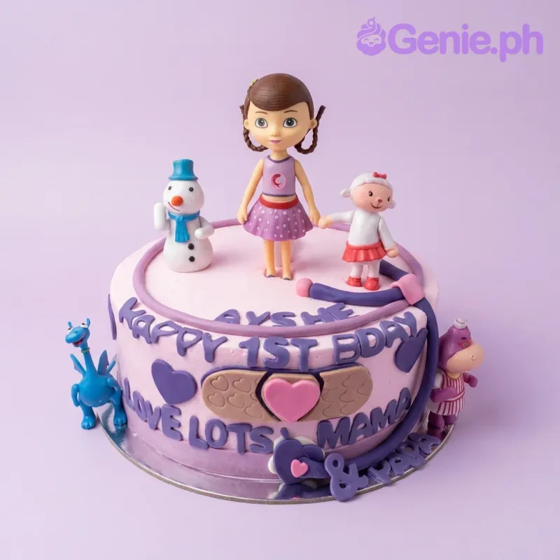 A white and light purple 1 Tier cake themed around Doc McStuffins, featuring 3D fondant figures of Doc, Lambie, and Chilly, with icing messages and purple accents. A white and light purple 1 Tier cake themed around Doc McStuffins, featuring 3D fondant figures of Doc, Lambie, and Chilly, with icing messages and purple accents.