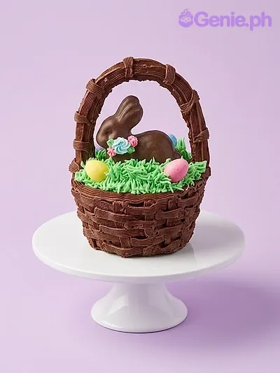 A brown and green 1-tier Easter Basket cake, featuring a brown bunny, basket weave, grass, and colorful eggs. A brown and green 1-tier Easter Basket cake, featuring a brown bunny, basket weave, grass, and colorful eggs.