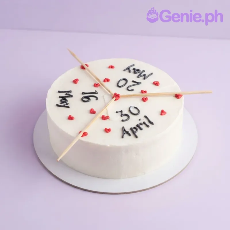 White bento cake with smooth soft icing, black piped text, and small red hearts White bento cake with smooth soft icing, black piped text, and small red hearts