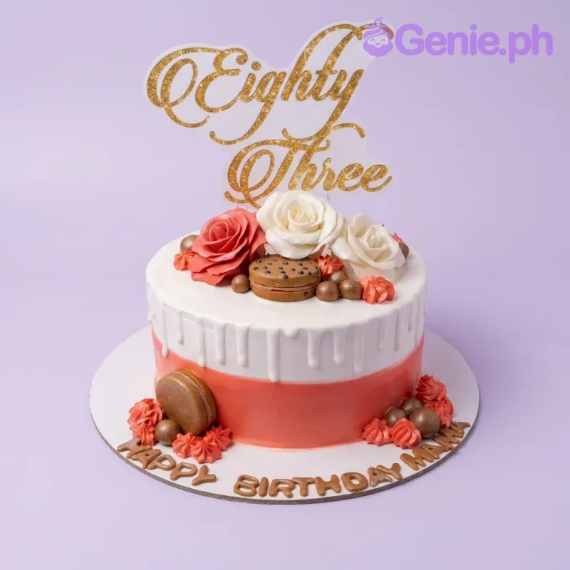 A white, pink, and red 1-tier cake themed for an Eighty Three birthday, featuring a gold glitter 'Eighty Three' topper, edible roses, and chocolate balls. A white, pink, and red 1-tier cake themed for an Eighty Three birthday, featuring a gold glitter 'Eighty Three' topper, edible roses, and chocolate balls.