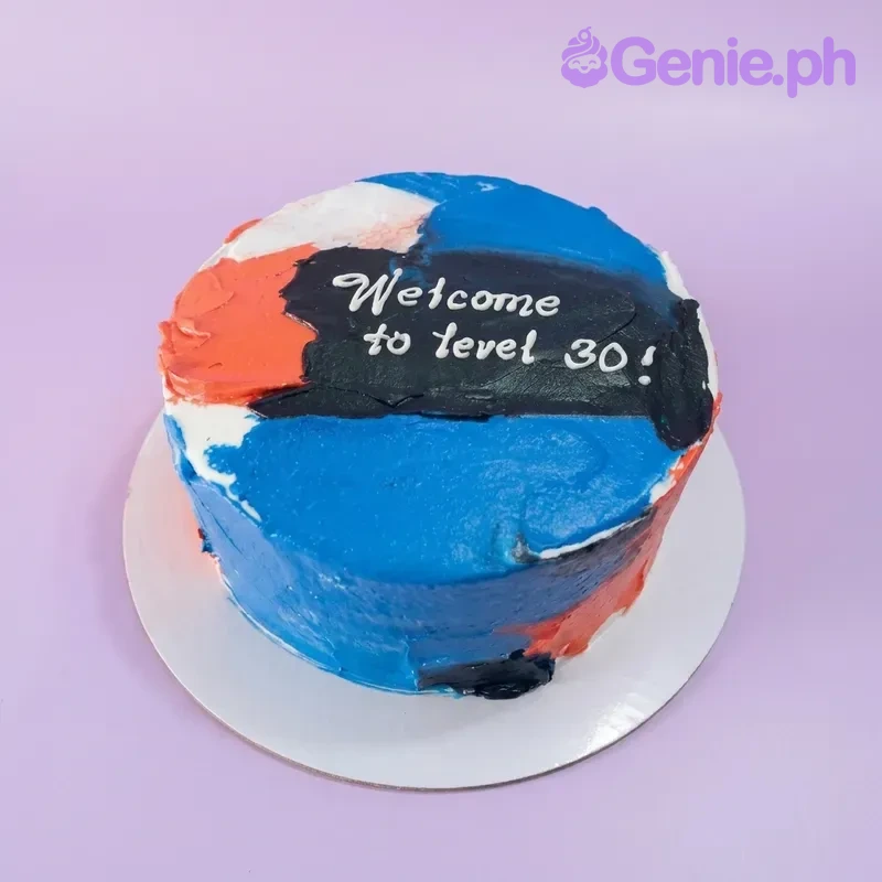 A blue, orange, and black 1-tier cake, Level 30 Birthday themed, with abstract palette knife icing and 'Welcome to level 30!' text.