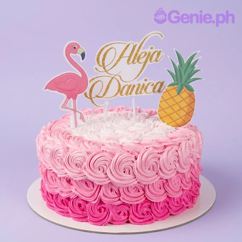 A pink ombre 1-tier cake themed Flamingo Tropical, with flamingo, pineapple, gold 'Aleja Danica' topper, and rosettes. A pink ombre 1-tier cake themed Flamingo Tropical, with flamingo, pineapple, gold 'Aleja Danica' topper, and rosettes.