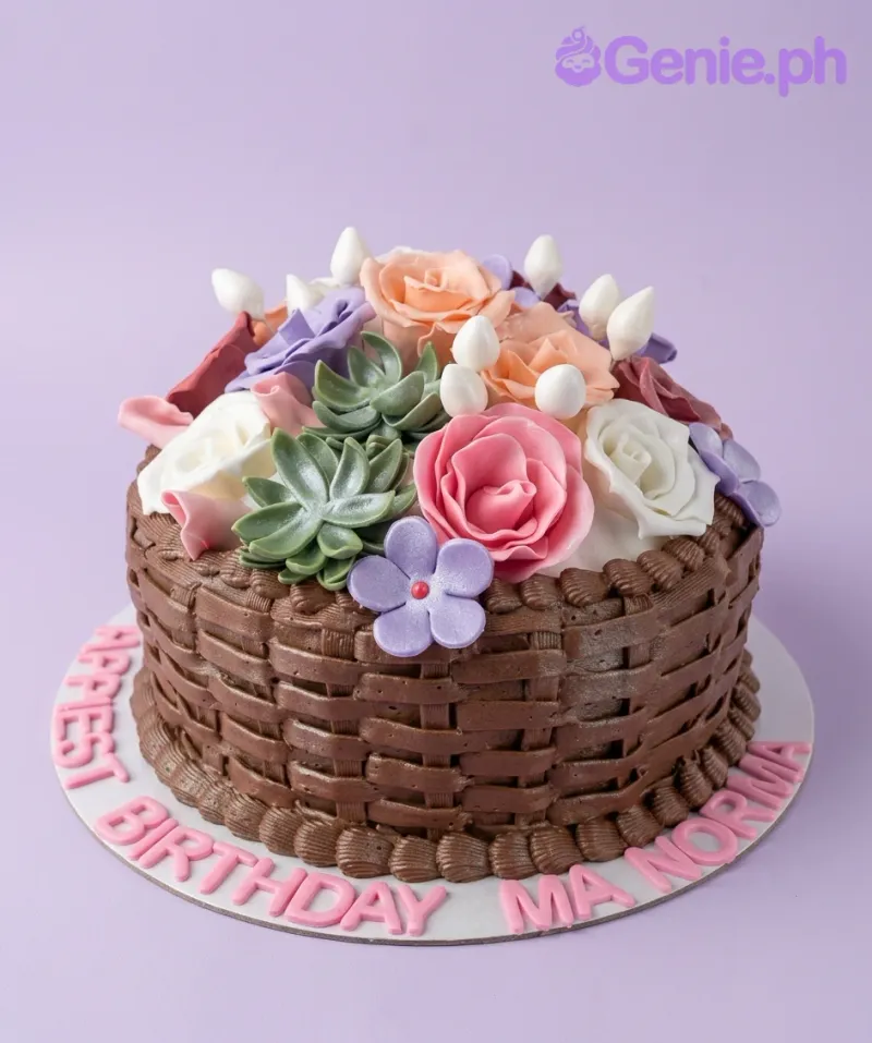 A brown and white 1-tier cake themed Floral Basket, featuring pink, peach, white fondant roses, green succulents, and basket weave icing. A brown and white 1-tier cake themed Floral Basket, featuring pink, peach, white fondant roses, green succulents, and basket weave icing.