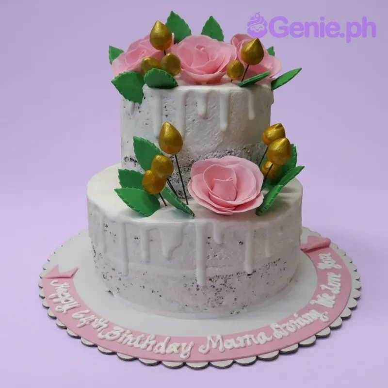 A two-tier semi-naked chocolate cake with white icing drips, pink fondant roses, gold decorative buds, and green leaves. A two-tier semi-naked chocolate cake with white icing drips, pink fondant roses, gold decorative buds, and green leaves.