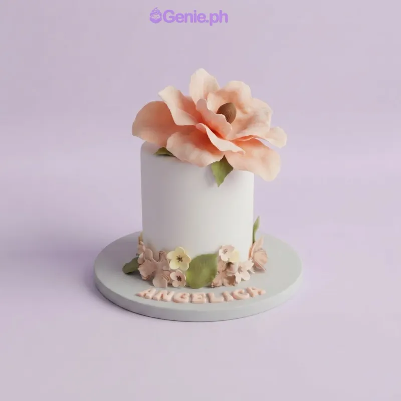 White 1-tier cake with a large peach gumpaste flower on top and small floral accents at the base White 1-tier cake with a large peach gumpaste flower on top and small floral accents at the base