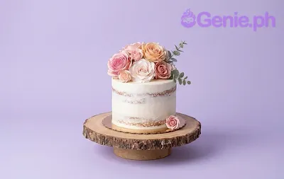 A white and pink 1 Tier smash cake themed around floral elements, featuring fresh pink and white flowers and a rustic wood stand. A white and pink 1 Tier smash cake themed around floral elements, featuring fresh pink and white flowers and a rustic wood stand.