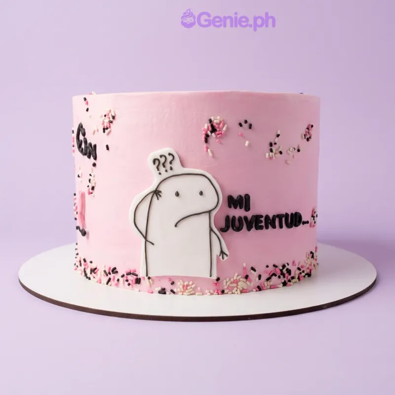 Flork Cake cake design — 1 layer soft icing cake in pink — with printout of Flork character, sprinkles on cake side, and custom "MI JUVENTUD..." message Flork Cake cake design — 1 layer soft icing cake in pink — with printout of Flork character, sprinkles on cake side, and custom "MI JUVENTUD..." message
