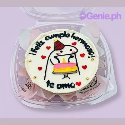 White bento cake with Flork character printout and red heart decorations White bento cake with Flork character printout and red heart decorations