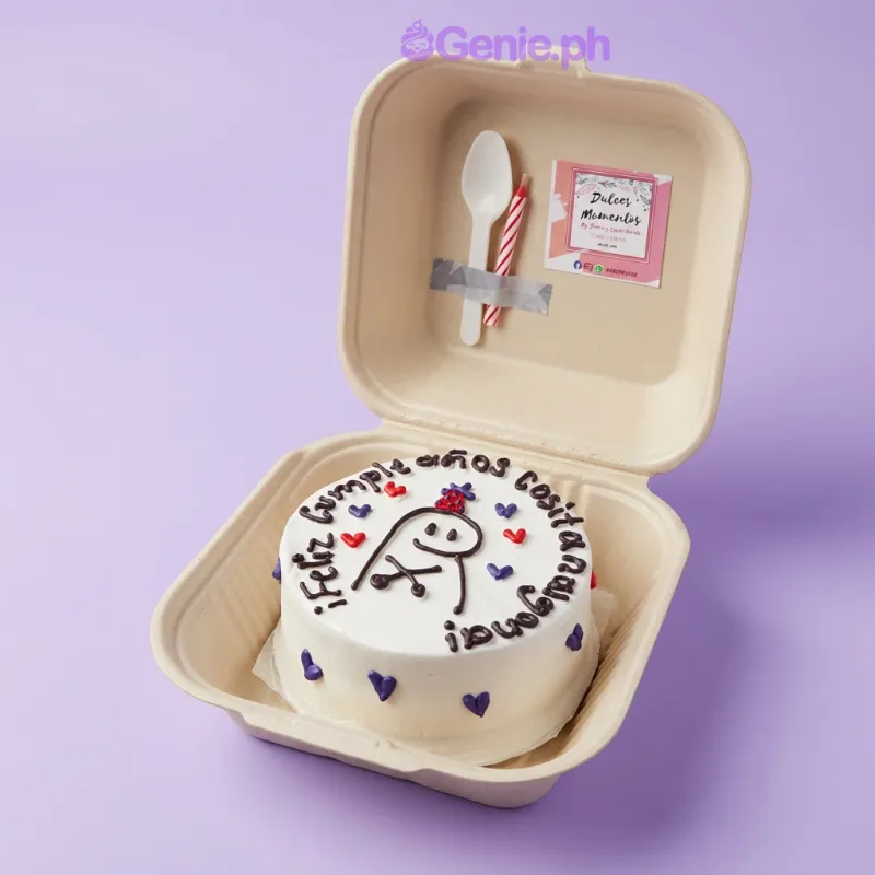 White bento cake with Flork character printout and red and purple heart icing decorations White bento cake with Flork character printout and red and purple heart icing decorations