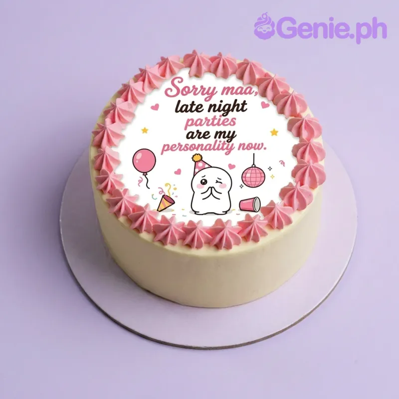A white and pink 1-tier cake themed around a Funny Mother, featuring a circular printout with a humorous message and pink icing rosettes. A white and pink 1-tier cake themed around a Funny Mother, featuring a circular printout with a humorous message and pink icing rosettes.