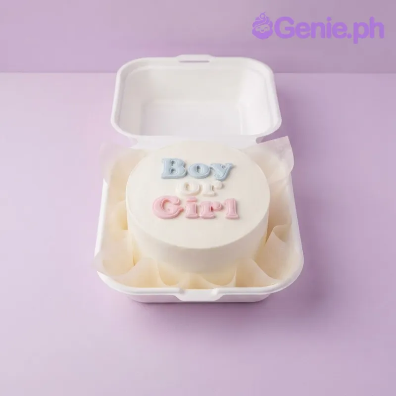 Gender reveal cake design — bento soft icing cake in champagne — with custom "Boy" message Gender reveal cake design — bento soft icing cake in champagne — with custom "Boy" message