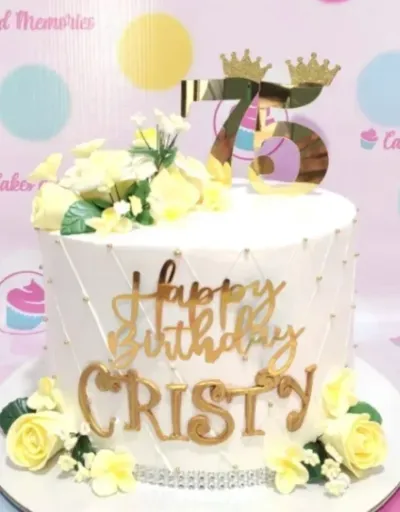 White 1-tier cake with soft icing, piped quilted lines, yellow fondant roses, and a gold number 75 topper White 1-tier cake with soft icing, piped quilted lines, yellow fondant roses, and a gold number 75 topper