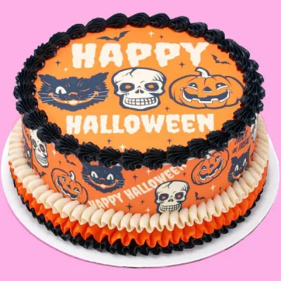 An orange and black single-tier Halloween cake with skull, pumpkin, cat graphics, and ruffled borders. An orange and black single-tier Halloween cake with skull, pumpkin, cat graphics, and ruffled borders.