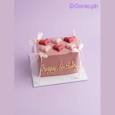Pink rectangle fondant cake with six heart shaped toppers and a piped message Pink rectangle fondant cake with six heart shaped toppers and a piped message