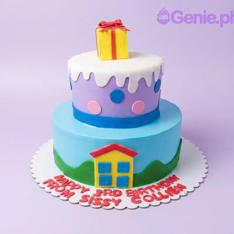 Two-tier colorful fondant cake with a yellow gift box topper, a yellow house decoration, and a purple tier with pink and blue polka dots. Two-tier colorful fondant cake with a yellow gift box topper, a yellow house decoration, and a purple tier with pink and blue polka dots.