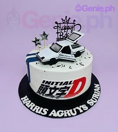 A white 1-Tier cake themed around Initial D, featuring a white Toyota AE86 car toy and a black 'Happy Birthday' topper. A white 1-Tier cake themed around Initial D, featuring a white Toyota AE86 car toy and a black 'Happy Birthday' topper.