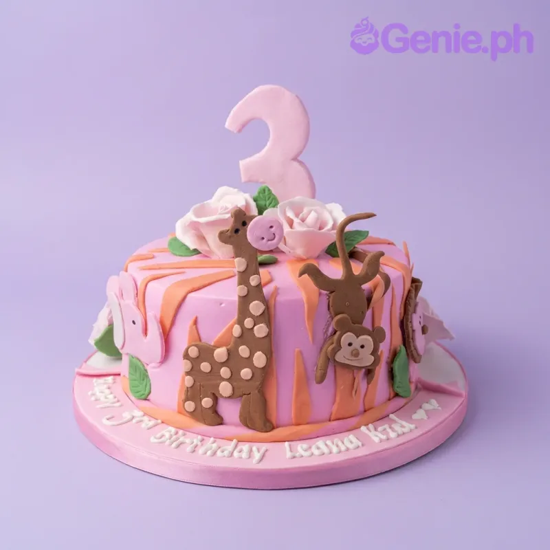 A pink 1 Tier Fondant cake, Jungle Animal themed, with giraffe, monkey, elephant, number 3, and pink roses. A pink 1 Tier Fondant cake, Jungle Animal themed, with giraffe, monkey, elephant, number 3, and pink roses.