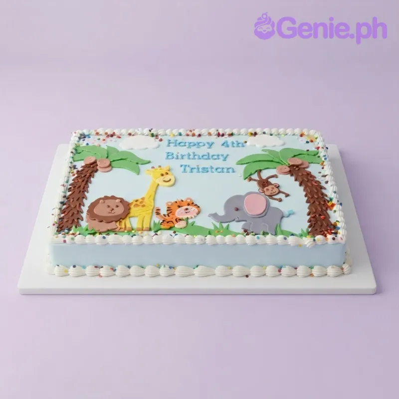 Light blue rectangular sheet cake with fondant jungle animals, palm trees, and piped blue borders Light blue rectangular sheet cake with fondant jungle animals, palm trees, and piped blue borders