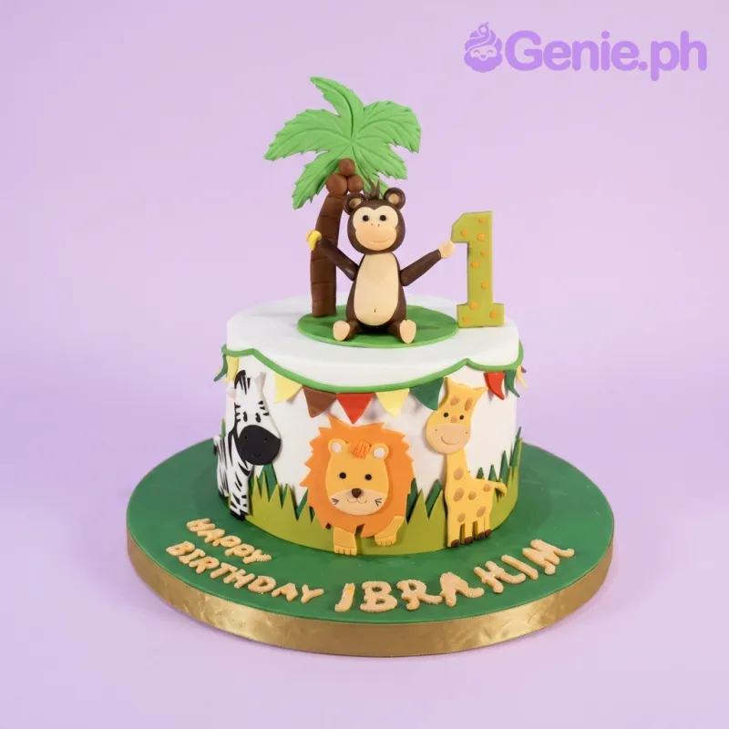A white and green 1-tier fondant cake, Jungle Safari themed, featuring a monkey, palm tree, '1', and safari animals. A white and green 1-tier fondant cake, Jungle Safari themed, featuring a monkey, palm tree, '1', and safari animals.