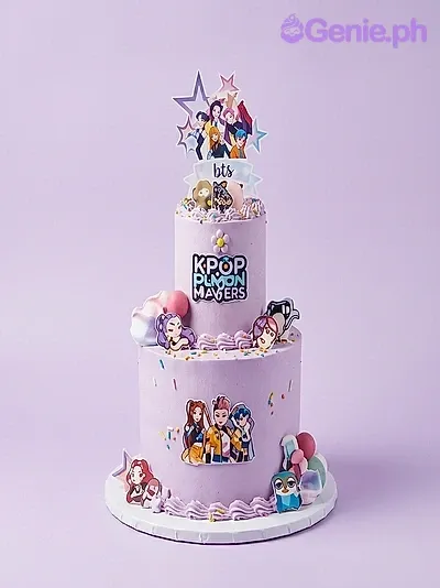 A purple and pink 2-tier cake themed around K-pop, featuring printed character toppers, pink rosettes, and yellow stars. A purple and pink 2-tier cake themed around K-pop, featuring printed character toppers, pink rosettes, and yellow stars.