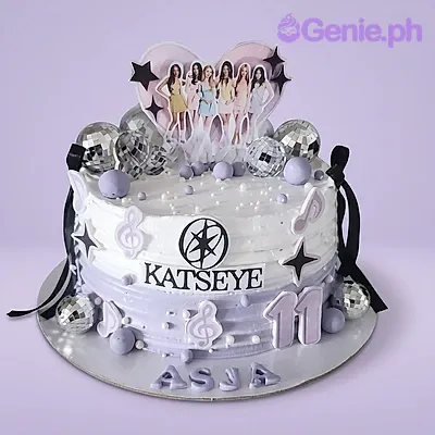 Lavender and white 1-tier cake with Katseye group photo topper and number 11 Lavender and white 1-tier cake with Katseye group photo topper and number 11