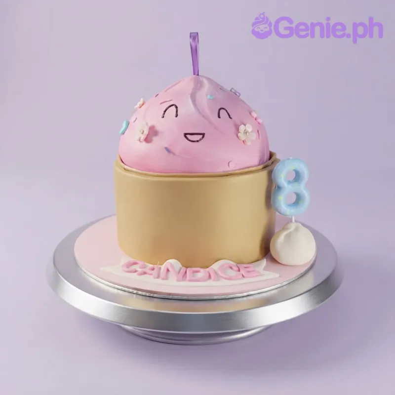 Tan 1 tier fondant cake with smooth icing, Kawaii Bento theme, pink flowers, and a blue number candle Tan 1 tier fondant cake with smooth icing, Kawaii Bento theme, pink flowers, and a blue number candle