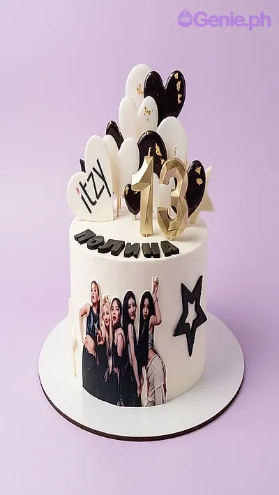 White 1-tier cake with ITZY group photo, ITZY logo heart, number 13 candles, and black star cutout White 1-tier cake with ITZY group photo, ITZY logo heart, number 13 candles, and black star cutout