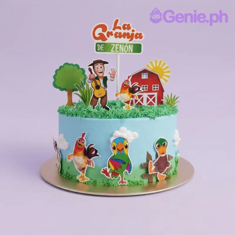 Light blue 1-tier birthday cake with soft icing, green piped grass, and La Granja printed paper toppers Light blue 1-tier birthday cake with soft icing, green piped grass, and La Granja printed paper toppers