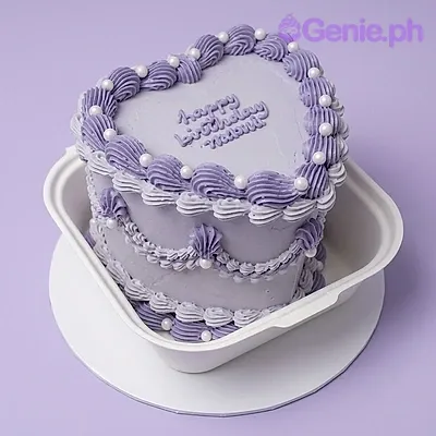 A lavender and white 1 Tier cake themed for a birthday, featuring white pearl dragees and 'Happy Birthday Beautiful' text. A lavender and white 1 Tier cake themed for a birthday, featuring white pearl dragees and 'Happy Birthday Beautiful' text.