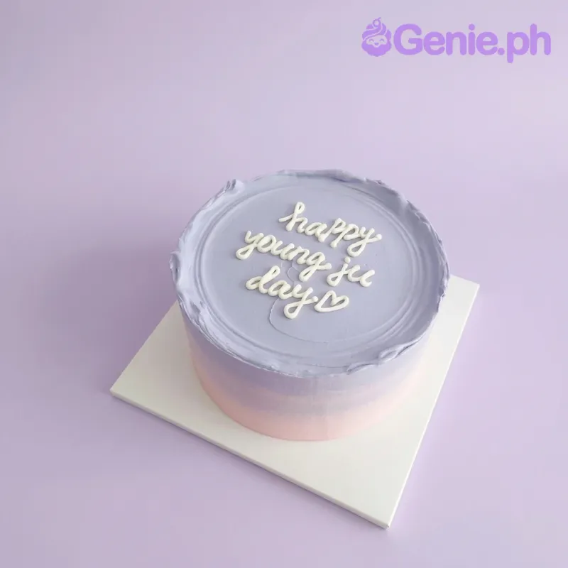 A lavender and peach 1 tier cake themed around minimalist design, featuring a white piped icing message and a heart. A lavender and peach 1 tier cake themed around minimalist design, featuring a white piped icing message and a heart.