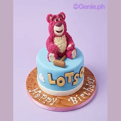 Light blue 1-tier fondant cake with a Lotso bear character topper and a small mallet prop Light blue 1-tier fondant cake with a Lotso bear character topper and a small mallet prop