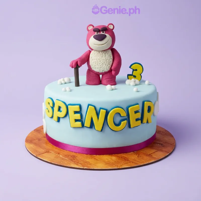 Light blue 1-tier fondant cake with a Lotso bear topper and Spencer name message Light blue 1-tier fondant cake with a Lotso bear topper and Spencer name message