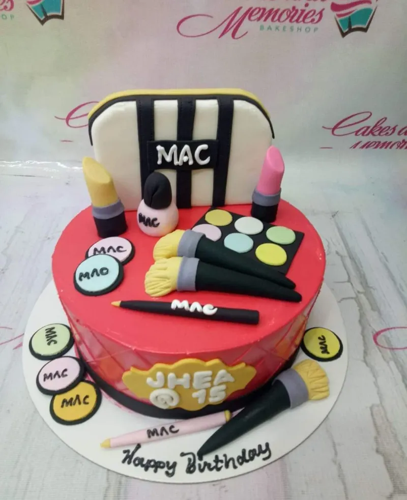 A red fondant 1-tier cake themed around makeup, with edible 3D makeup bag, brushes, eyeshadow palette, and lipsticks. A red fondant 1-tier cake themed around makeup, with edible 3D makeup bag, brushes, eyeshadow palette, and lipsticks.