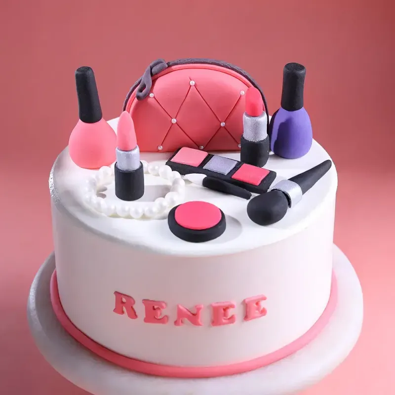 White 1-tier fondant cake with sculpted makeup bag, lipsticks, and nail polish toppers for a birthday White 1-tier fondant cake with sculpted makeup bag, lipsticks, and nail polish toppers for a birthday