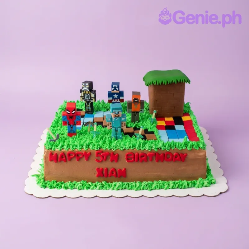 A green and brown rectangle Minecraft Superhero cake with pixelated characters, a block structure, and grass icing. A green and brown rectangle Minecraft Superhero cake with pixelated characters, a block structure, and grass icing.