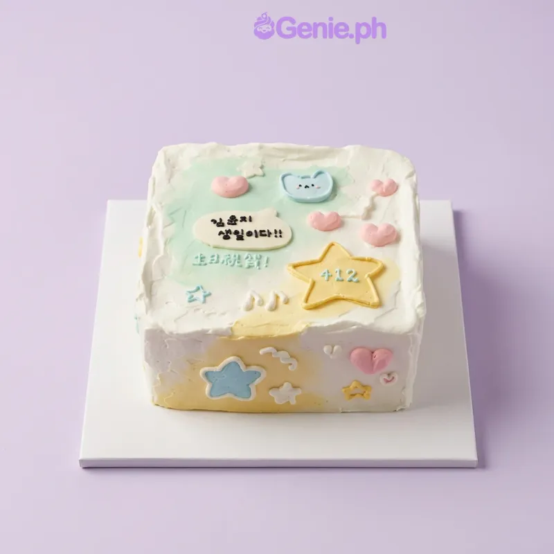 White square cake with bear face, star, and heart decorations for a birthday White square cake with bear face, star, and heart decorations for a birthday