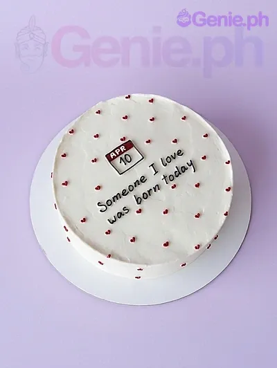 A white and red 1-tier cake themed Minimalist Calendar, featuring an April 10 calendar printout, red icing hearts, and black text. A white and red 1-tier cake themed Minimalist Calendar, featuring an April 10 calendar printout, red icing hearts, and black text.