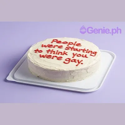 White round cake with red piped text saying People were starting to think you were gay White round cake with red piped text saying People were starting to think you were gay