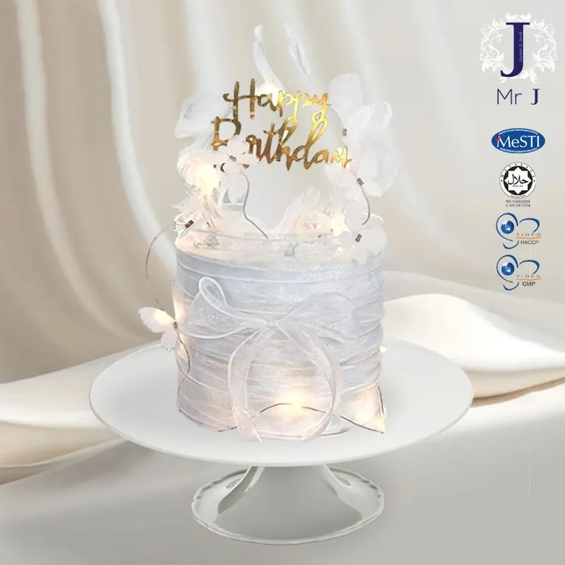 Minimalist white 1 tier cake with gold happy birthday topper and white fabric bow Minimalist white 1 tier cake with gold happy birthday topper and white fabric bow