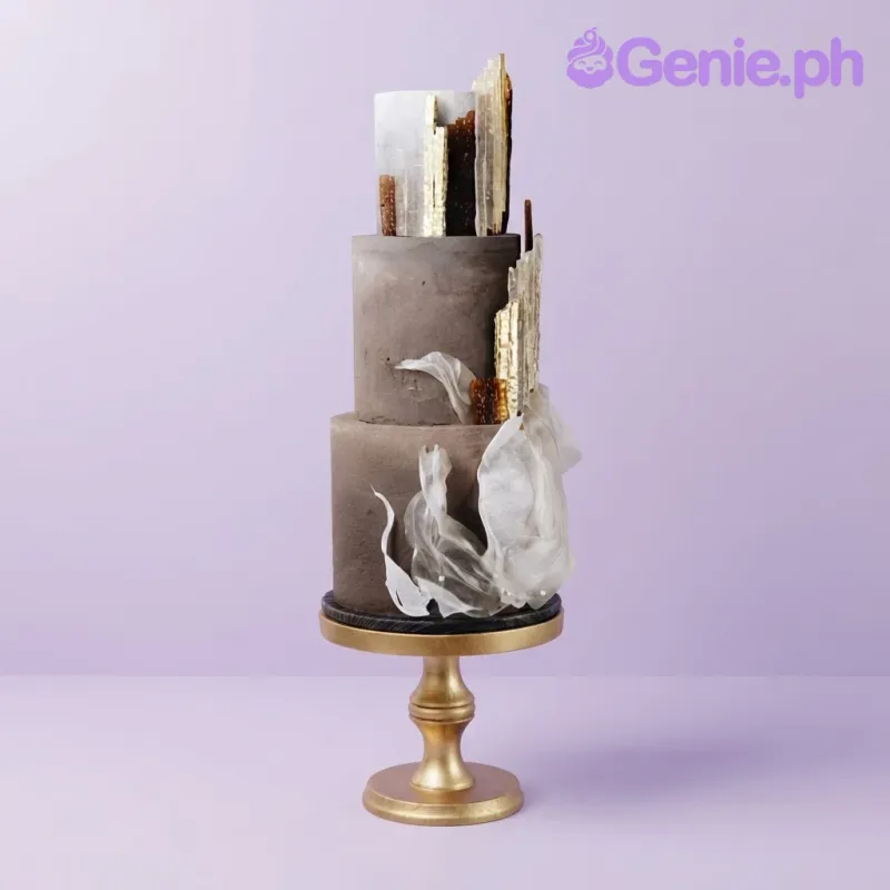 White and brown gradient 3-tier cake with smooth soft icing in a modern art design White and brown gradient 3-tier cake with smooth soft icing in a modern art design