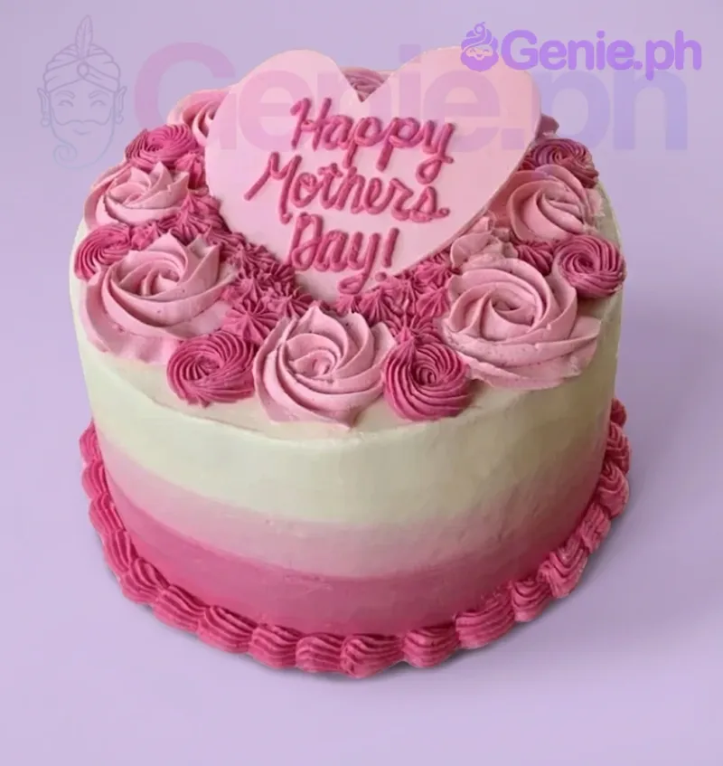 Pink ombre Mother's Day cake with a large pink heart topper, 'Happy Mother's Day!' text, and pink rosettes. Pink ombre Mother's Day cake with a large pink heart topper, 'Happy Mother's Day!' text, and pink rosettes.