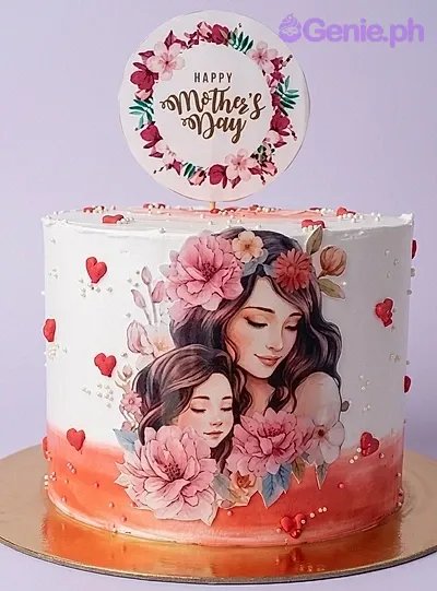White and red Mother's Day cake featuring a large printout of a mother and daughter with pink flowers and a Happy Mother's Day topper. White and red Mother's Day cake featuring a large printout of a mother and daughter with pink flowers and a Happy Mother's Day topper.